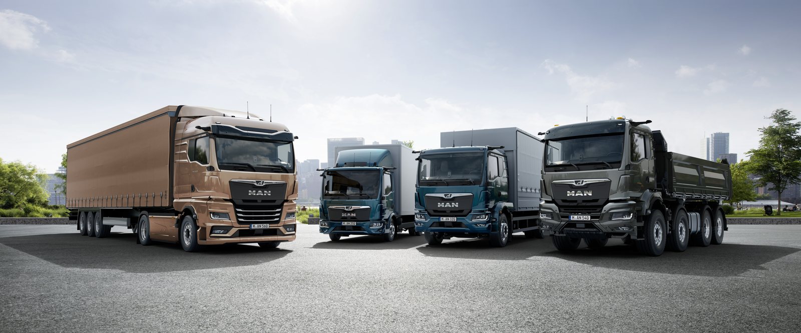 MAN MY25 diesel truck range: tractor unit, distribution trucks and tipper lined up